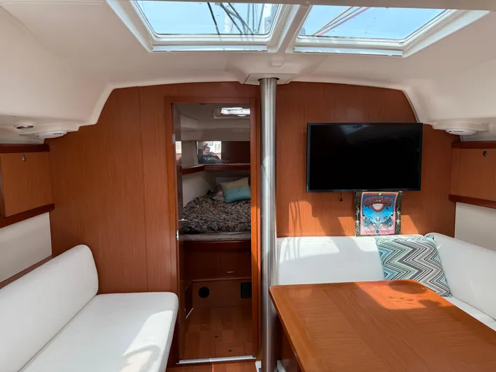Deep Unreal Yacht Photos Pics Interior of 2008 Beneteau Oceanis 40 sailboat with cozy seating and modern amenities.