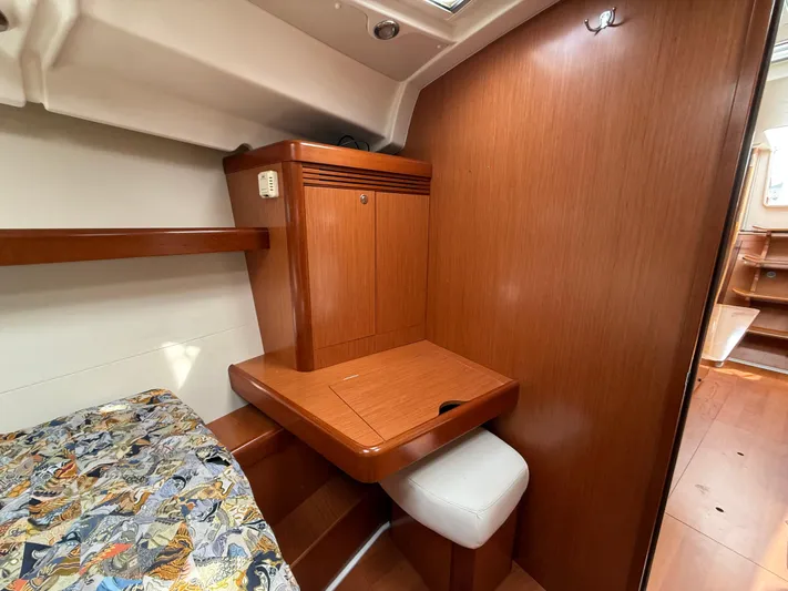 Deep Unreal Yacht Photos Pics Interior of 2008 Beneteau Oceanis 40 yacht with wooden cabinetry and seating.