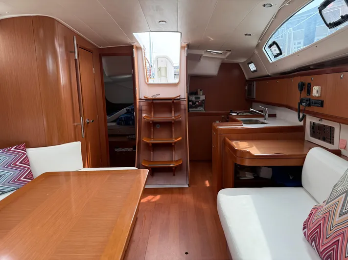 Deep Unreal Yacht Photos Pics Interior of 2008 Beneteau Oceanis 40 sailboat with wood finish and modern amenities.