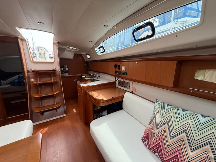 Deep Unreal Yacht Photos Pics Interior of 2008 Beneteau Oceanis 40 sailboat with wood finish and modern amenities.