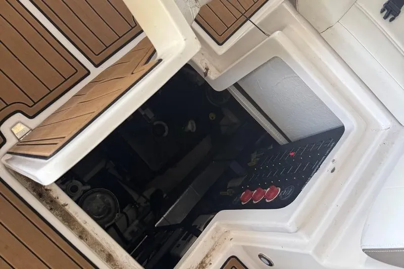  Yacht Photos Pics Open engine compartment of 2016 Regal 46 Sport Coupe with visible control panel.