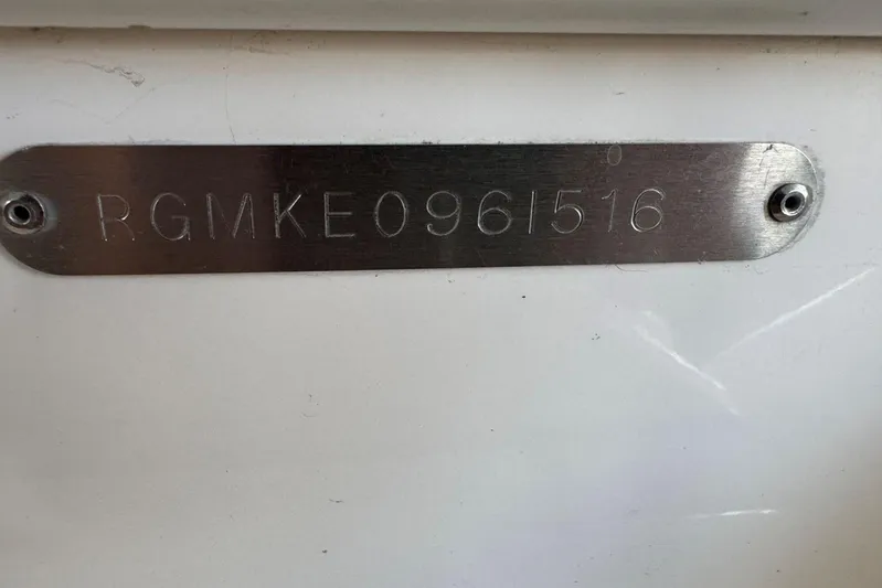  Yacht Photos Pics Metallic identification plate on a 2016 Regal 46 Sport Coupe boat.