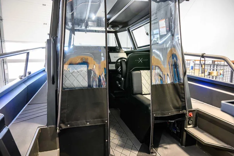  Yacht Photos Pics 2024 StabiX 240UCC boat interior with modern seating and clear protective covers.