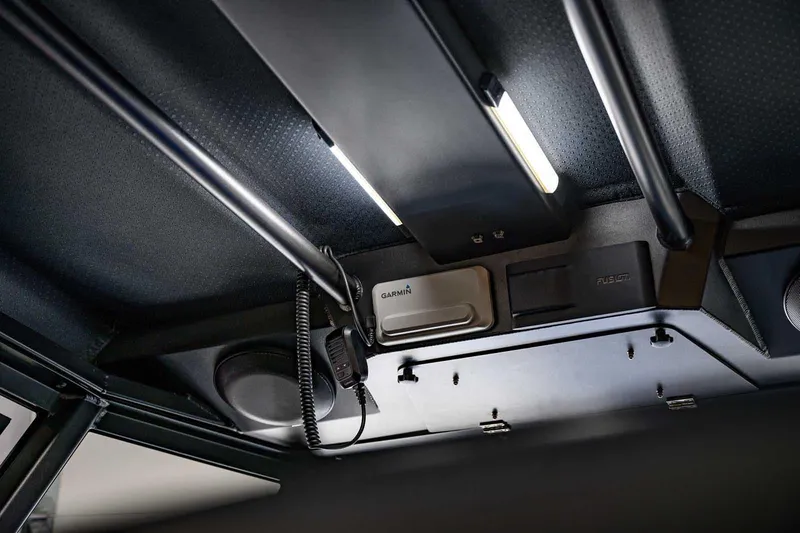  Yacht Photos Pics Interior view of 2024 StabiX 240UCC with mounted electronic devices and lighting.