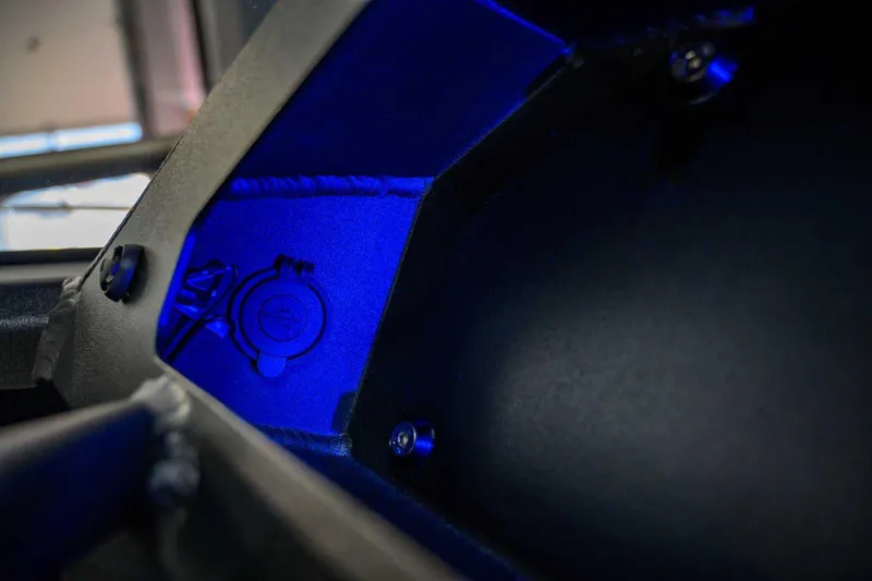  Yacht Photos Pics Interior view of 2024 StabiX 240UCC with blue lighting and detailed components.