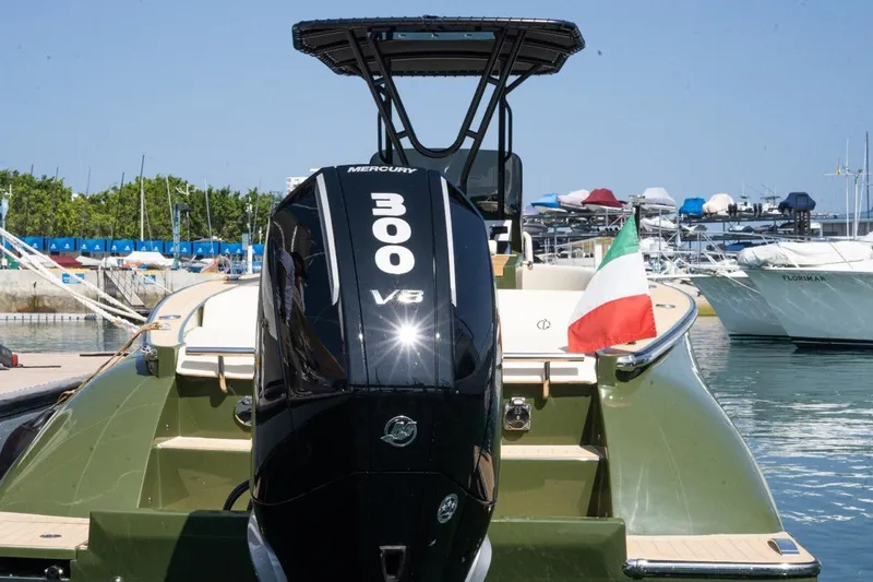  Yacht Photos Pics 2026 Lilybaeum Levanzo 25 Lounge Deck boat with Mercury 300 V8 engine, Italian flag displayed.