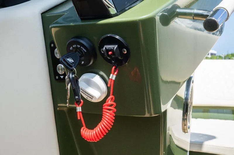  Yacht Photos Pics Control panel of Lilybaeum Levanzo 25 Lounge Deck, featuring ignition keys and safety lanyard, 2026 model.