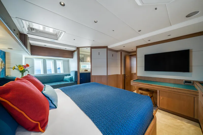 Karibu Yacht Photos Pics Luxurious interior of 2013 Oyster 885 yacht with modern bedroom and large TV.