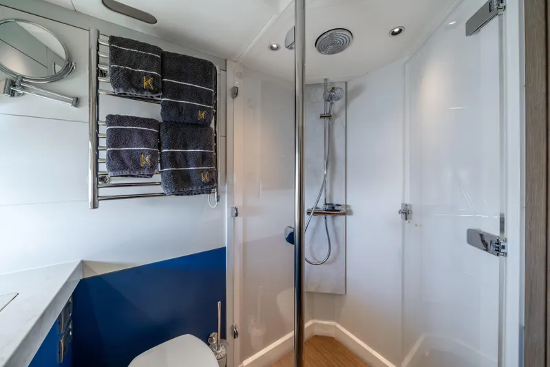 Karibu Yacht Photos Pics Luxurious bathroom in 2013 Oyster 885 yacht with modern shower and towel rack.