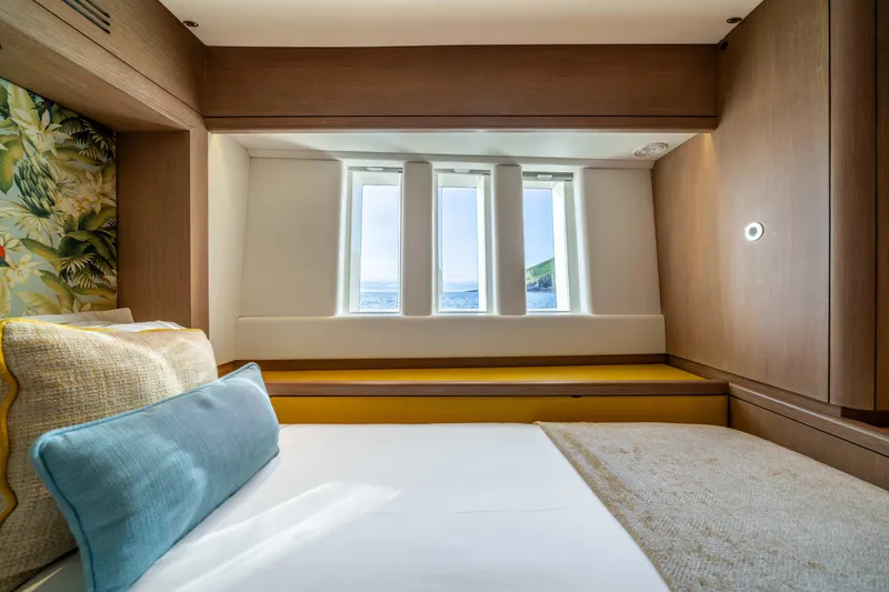 Karibu Yacht Photos Pics Luxurious cabin interior of 2013 Oyster 885 yacht with ocean view through windows.