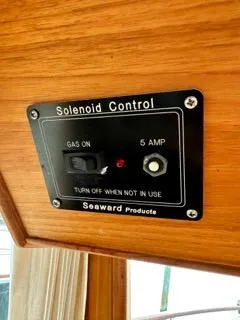 Its About Time Yacht Photos Pics Solenoid control panel on 1996 Grand Banks Classic boat, featuring gas and 5 amp switch.