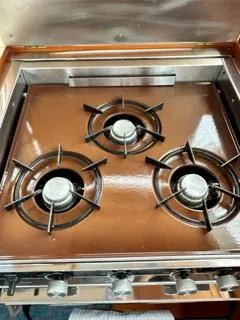 Its About Time Yacht Photos Pics Three-burner stove on a 1996 Grand Banks Classic yacht.