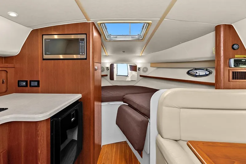  Yacht Photos Pics Interior of 2005 Tiara Open Classic boat with modern amenities and cozy seating.