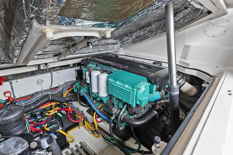  Yacht Photos Pics Engine compartment of a 2005 Tiara Open Classic boat, showcasing detailed wiring and components.