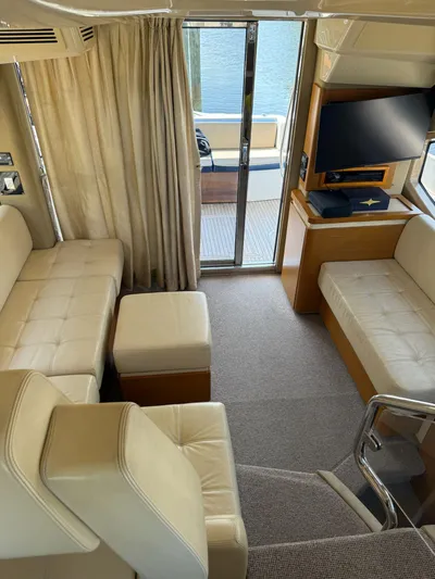 Luna Yacht Photos Pics Luxurious interior of 2014 Azimut Atlantis 45 yacht with beige seating and modern decor.