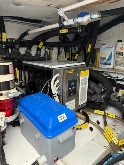 Luna Yacht Photos Pics Engine room of a 2014 Azimut Atlantis 45 yacht with labeled components and equipment.