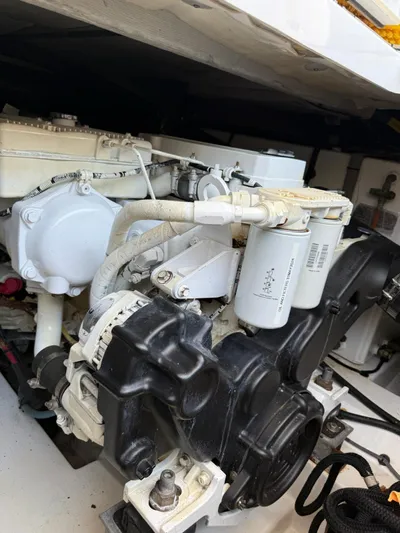 Luna Yacht Photos Pics Engine compartment of a 2014 Azimut Atlantis 45 yacht, showcasing mechanical components.