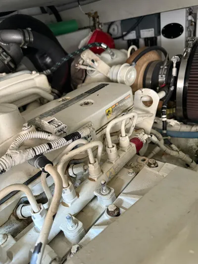 Luna Yacht Photos Pics Engine compartment of a 2014 Azimut Atlantis 45 yacht, showcasing mechanical components.