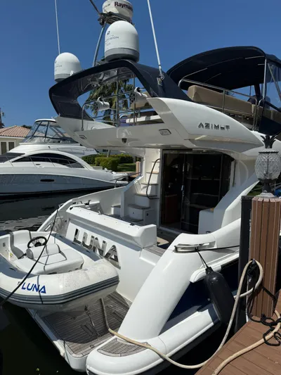 Luna Yacht Photos Pics Azimut Atlantis 45 yacht, 2014 model, docked with inflatable boat named Luna.