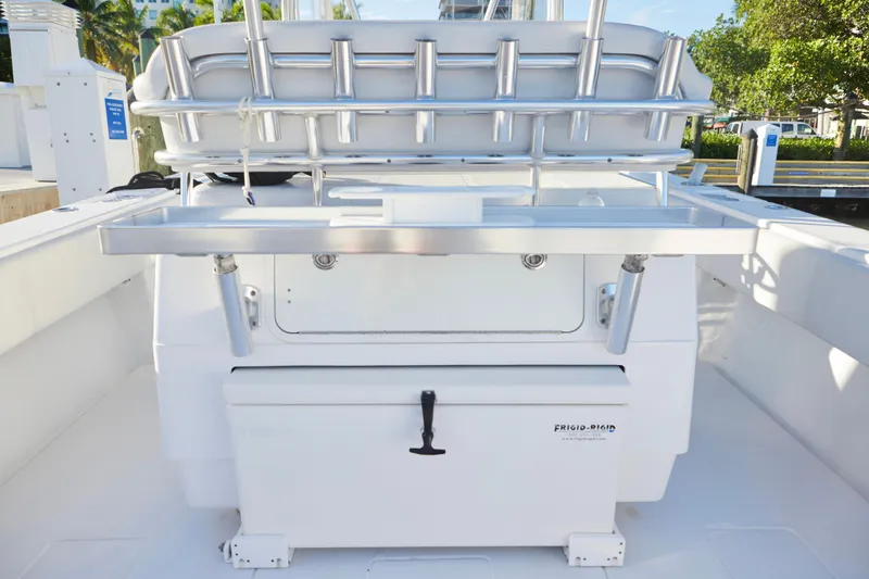  Yacht Photos Pics 2014 Contender 39 ST boat interior with fishing rod holders and storage.