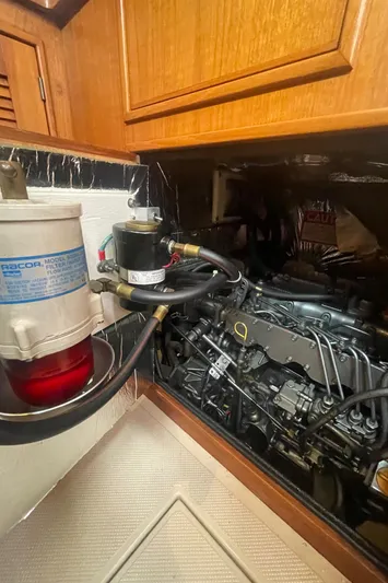  Yacht Photos Pics Engine compartment of a 1995 Island Packet 40 sailboat, featuring a Racor fuel filter.
