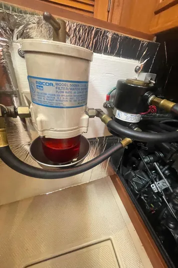  Yacht Photos Pics Fuel filter system in 1995 Island Packet 40 sailboat engine compartment.