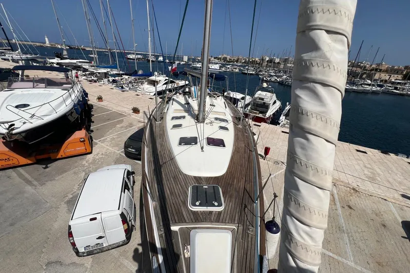 Roberto Goracci Yacht Photos Pics Beneteau Oceanis Clipper 473 sailboat docked at marina, 2003 model, aerial view.