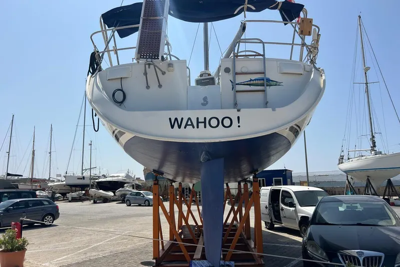Roberto Goracci Yacht Photos Pics 2003 Beneteau Oceanis Clipper 473 sailboat named "WAHOO!" on dry dock.