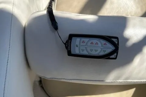  Yacht Photos Pics Remote control on white leather seat of 2008 Meridian 391 Sedan boat.