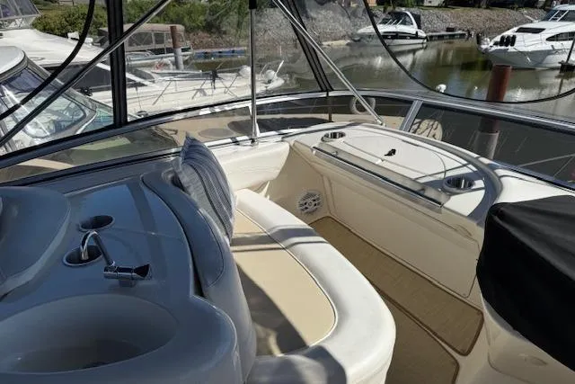  Yacht Photos Pics 2008 Meridian 391 Sedan yacht interior with seating and marina view.