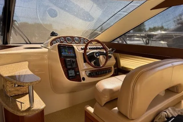  Yacht Photos Pics 2008 Meridian 391 Sedan yacht interior with luxurious helm and leather seating.
