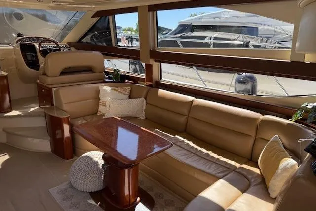  Yacht Photos Pics Luxurious interior of a 2008 Meridian 391 Sedan yacht with leather seating and wooden accents.