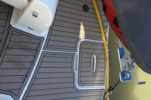  Yacht Photos Pics 2008 Meridian 391 Sedan boat deck with teak flooring and mooring equipment.