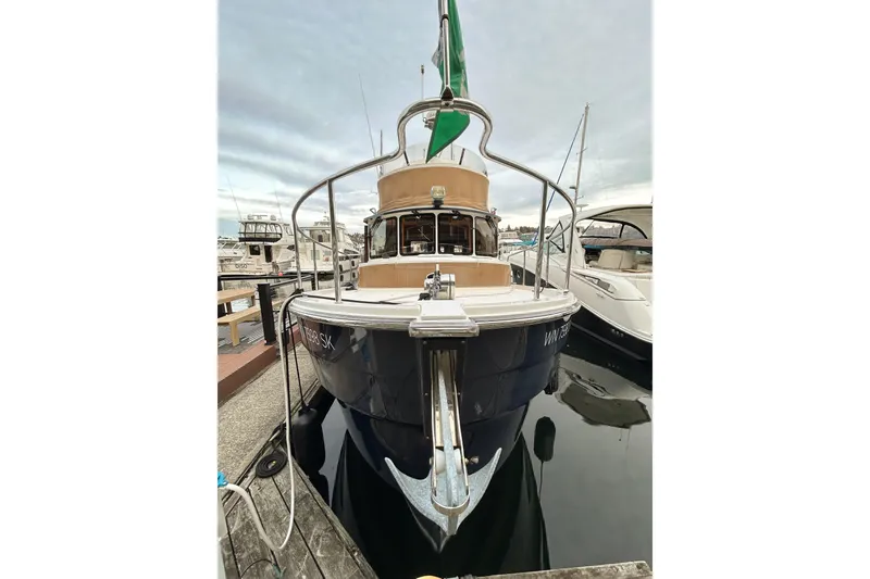  Yacht Photos Pics 2017 Ranger Tugs R-31 CB docked at marina, front view.