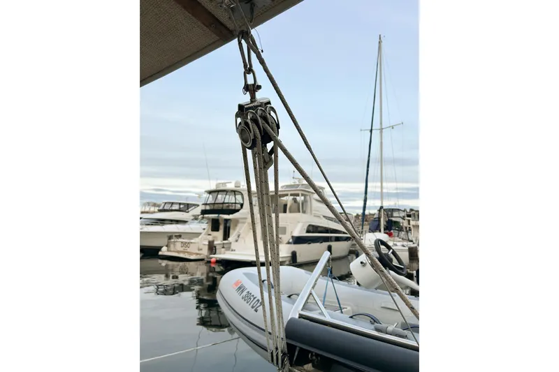  Yacht Photos Pics Docked Ranger Tugs R-31 CB boat with rigging, 2017 model, in a marina setting.