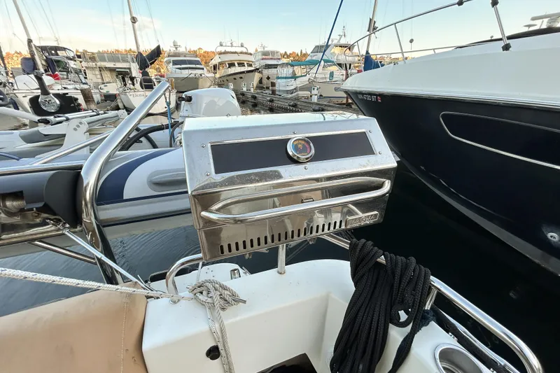  Yacht Photos Pics 2017 Ranger Tugs R-31 CB boat with stainless steel grill at marina.