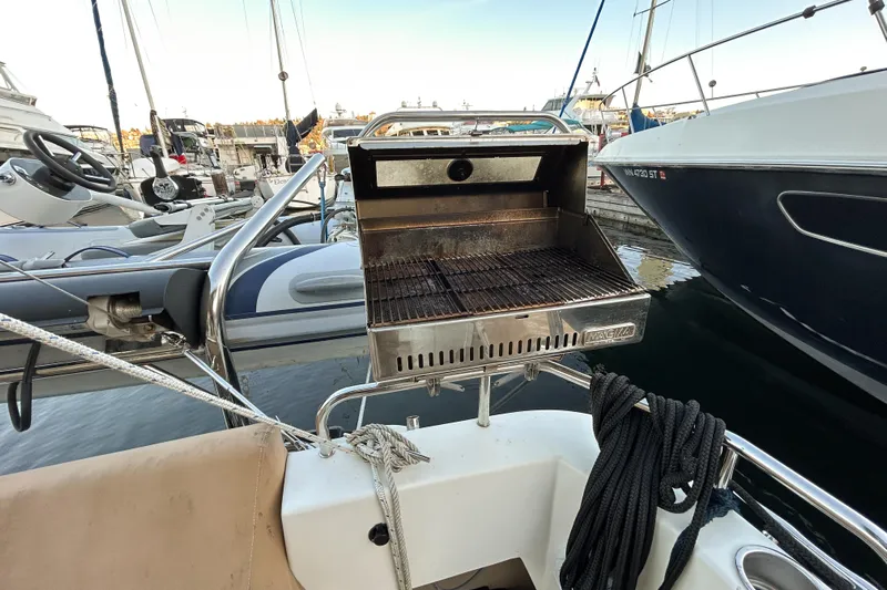  Yacht Photos Pics Outdoor grill on 2017 Ranger Tugs R-31 CB boat, docked at marina.