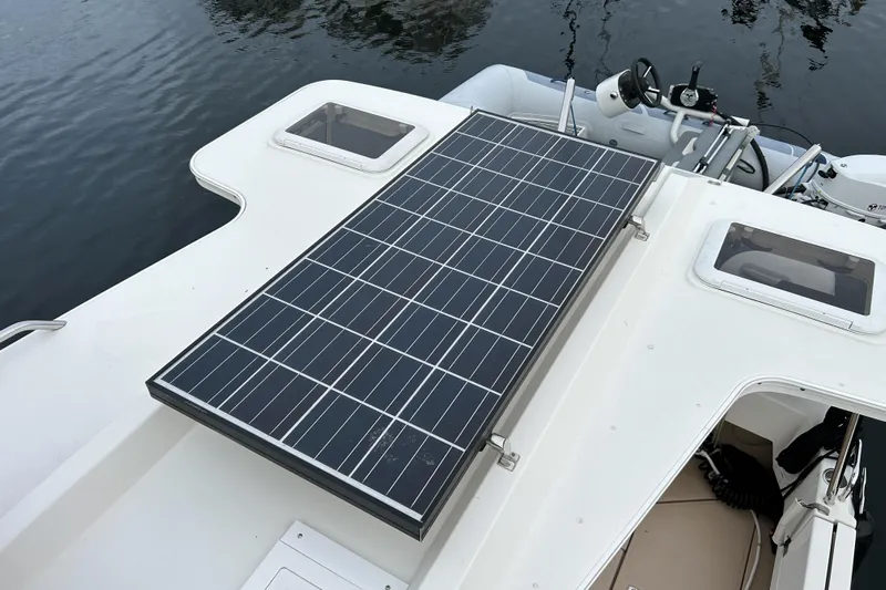  Yacht Photos Pics Solar panel on 2017 Ranger Tugs R-31 CB boat, docked on calm water.