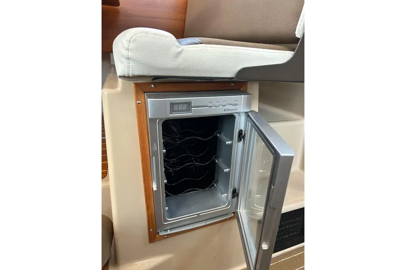  Yacht Photos Pics 2017 Ranger Tugs R-31 CB interior with open Dometic wine cooler.