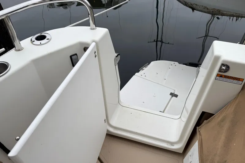  Yacht Photos Pics 2017 Ranger Tugs R-31 CB boat deck with open gate and water reflection.