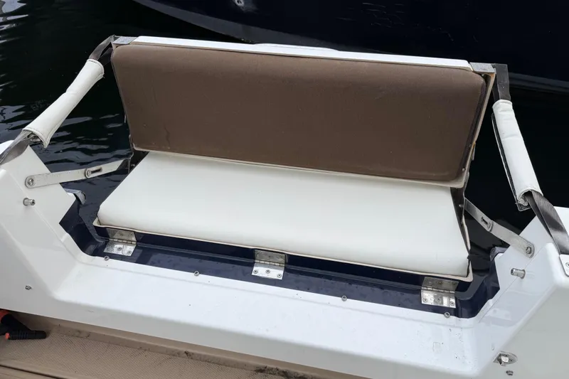  Yacht Photos Pics 2017 Ranger Tugs R-31 CB boat seat with brown and white cushions.
