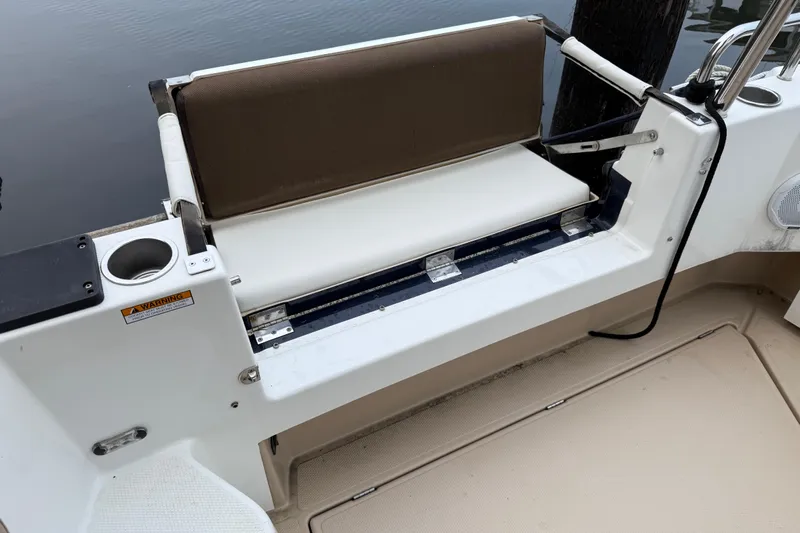  Yacht Photos Pics 2017 Ranger Tugs R-31 CB boat seating area with cup holder and cushion.
