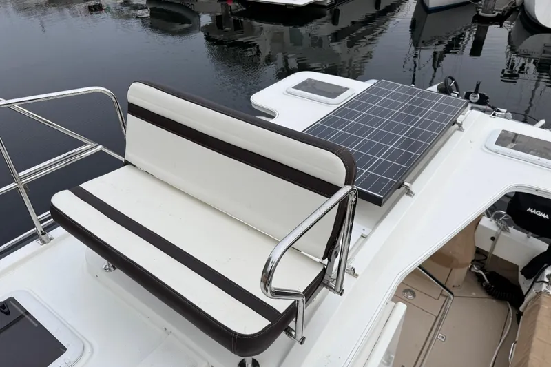  Yacht Photos Pics 2017 Ranger Tugs R-31 CB boat with solar panel and cushioned seating on deck.