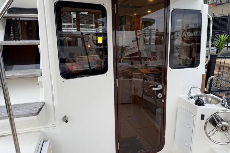  Yacht Photos Pics 2017 Ranger Tugs R-31 CB boat interior view with stairs and kitchenette.