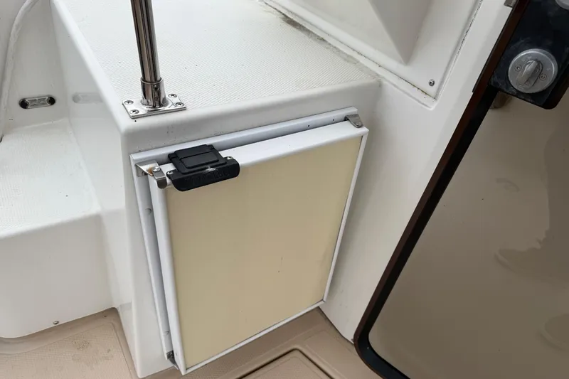  Yacht Photos Pics 2017 Ranger Tugs R-31 CB boat interior detail with storage compartment and railing.