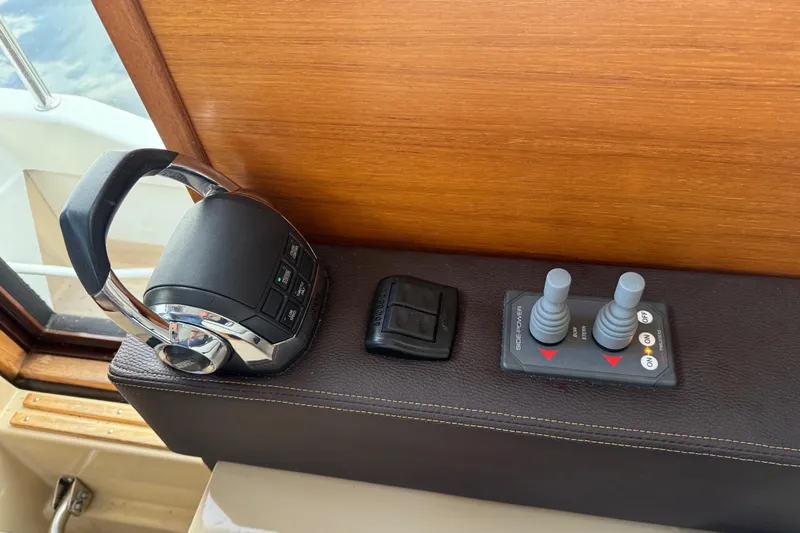  Yacht Photos Pics Control panel of 2017 Ranger Tugs R-31 CB boat with throttle and joystick controls.