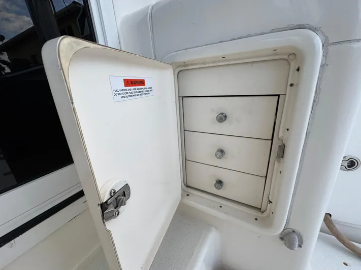  Yacht Photos Pics Open storage compartment with drawers on 2002 Riviera 40 Convertible boat.