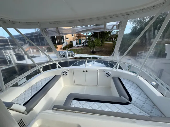  Yacht Photos Pics Riviera 40 Convertible 2002 yacht interior with spacious seating and panoramic windows.