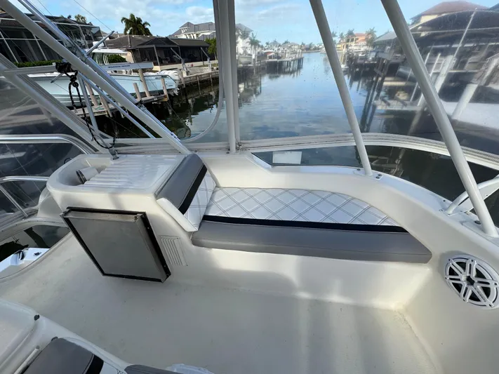  Yacht Photos Pics 2002 Riviera 40 Convertible yacht interior with seating and water view.