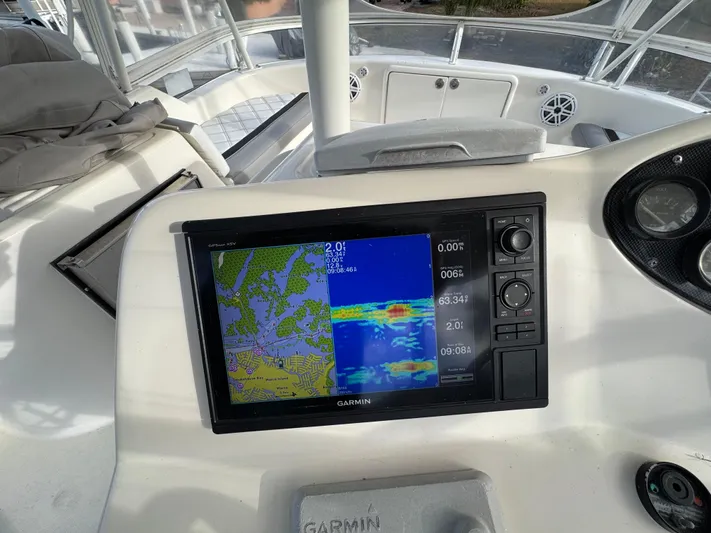  Yacht Photos Pics Garmin navigation system on 2002 Riviera 40 Convertible yacht dashboard.